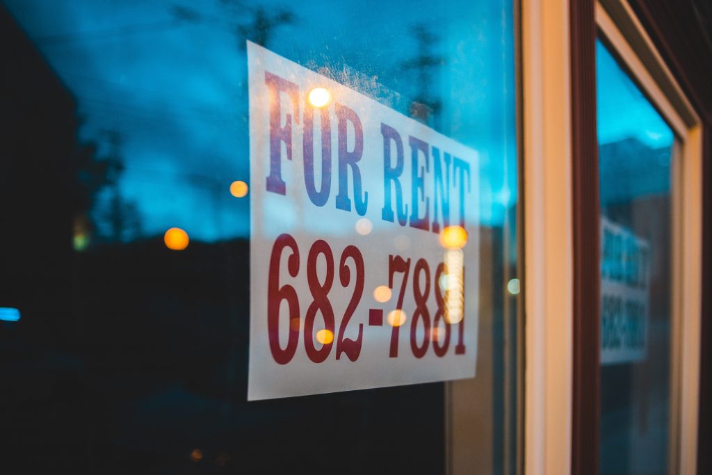3 Legal yet Sneaky Ways to Get Rid of Bad Tenants 3 "For Rent" sign in a window with a number to call.